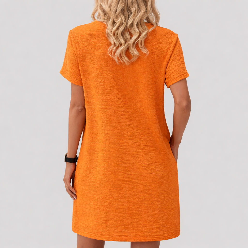 Luna™ | Elegant topp med dekorativa knappar och rund halsringning