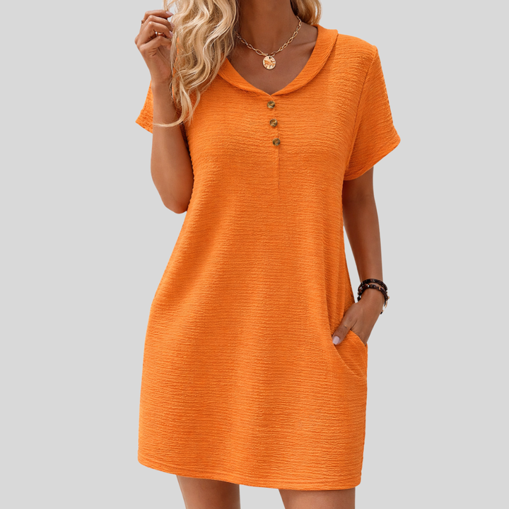 Luna™ | Elegant topp med dekorativa knappar och rund halsringning