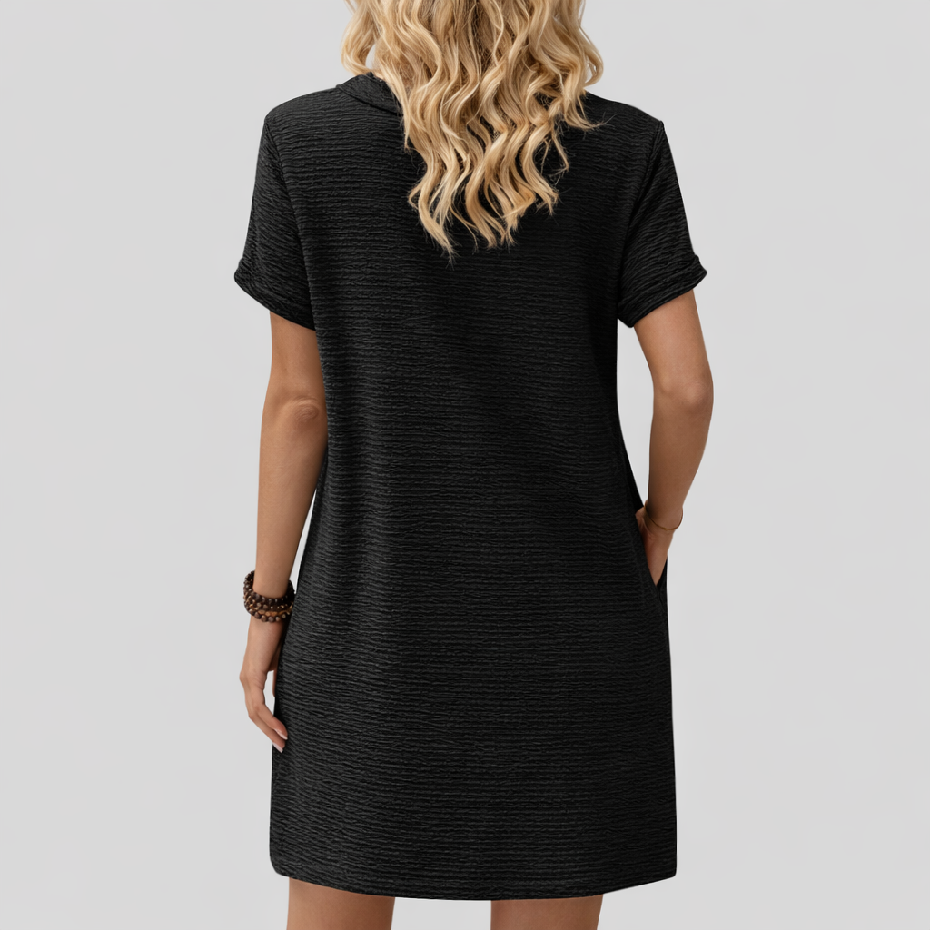Luna™ | Elegant topp med dekorativa knappar och rund halsringning